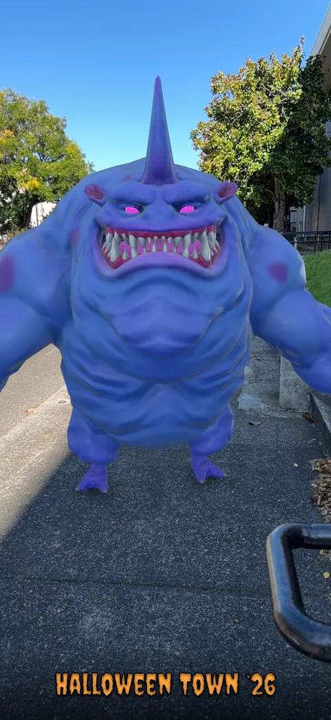 Blue Sharkie placed in an outdoor scene using Haunt Shot’s AR camera.