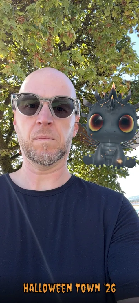 A souvenir selfie with the Water Dragon under the trees.